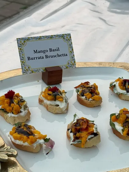 Mango Basil Burrata Bruschetta, a perfect summer appetizer. The sweetness of the mango, the creaminess of the burrata, and the freshness of basil create a delightful combination.