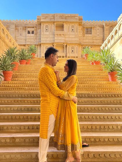Sharing a look of love amidst the golden architecture of Jaisalmer. These are the moments that become cherished memories.