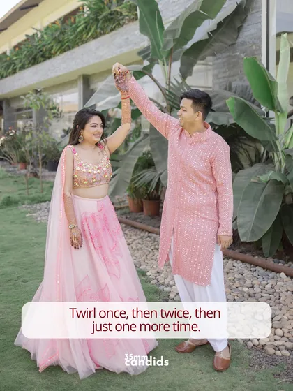 The feminine urge to twirl once, then twice, then just one more time. A playful shot of a couple dancing at their pre-wedding event.