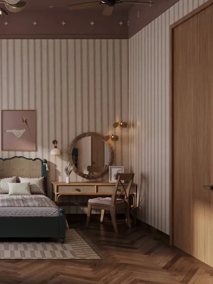 A quiet corner is transformed into a simple vanity or study area. The warm wood tones of the desk and chair complement the room's soft, neutral wallpaper, creating a functional space that feels integrated and calm.
