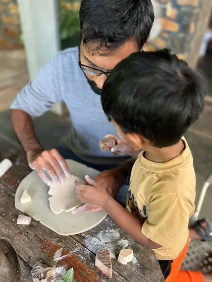 There is something truly special about watching a parent and child create together. This moment from a pottery retreat captures the quiet connection and shared focus that happens when you're shaping clay side-by-side.