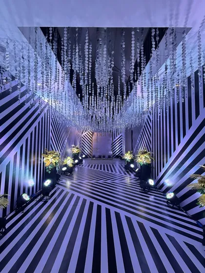 The complete look of the 'zebra' themed passage, a unique and unforgettable entrance for a modern Sangeet night.