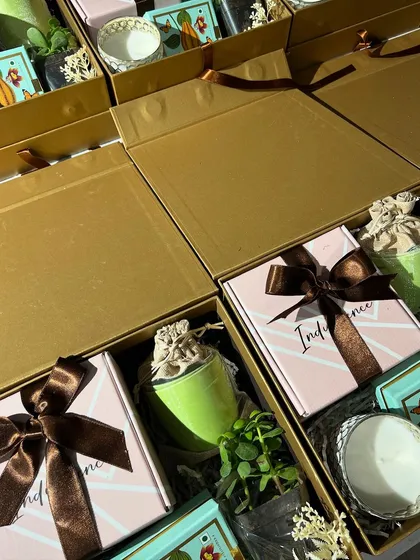 Getting these corporate gift boxes ready for shipment. The sturdy, elegant packaging ensures that the gifts arrive in perfect condition, no matter where in India they are headed.