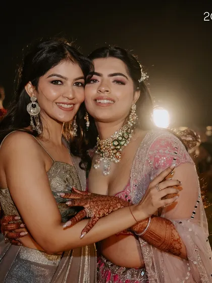 Hugging the beautiful bride at her wedding. My subtle yet elegant grey lehenga was the perfect choice to celebrate my friend without outshining her.