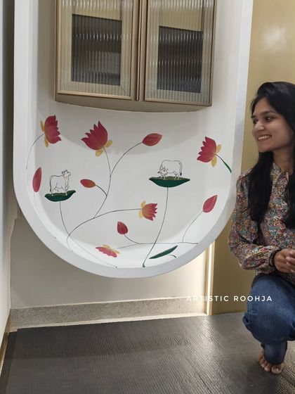 Another shot of me with the Pichwai office mural, highlighting the delicate details of the lotus flowers and cows.