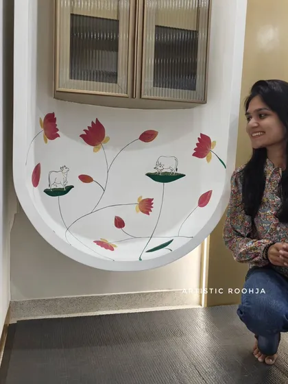Another shot of me with the Pichwai office mural, highlighting the delicate details of the lotus flowers and cows.