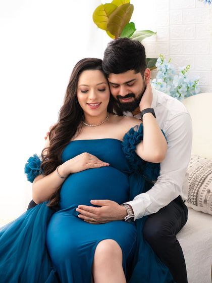 The loving gaze between this couple is undeniable. This intimate shot captures the deep bond and shared happiness of their pregnancy journey.