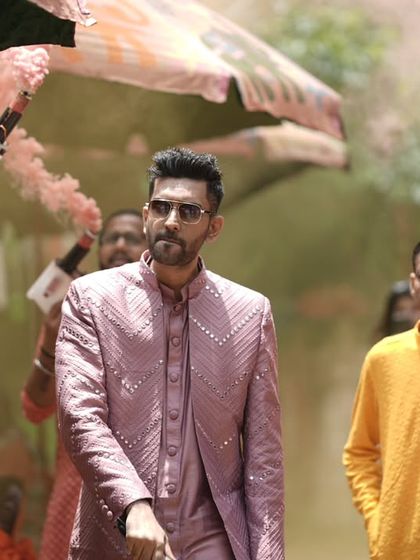 Surrounded by the wedding party, I ensure that the energy is infectious and that everyone is ready for the celebration.