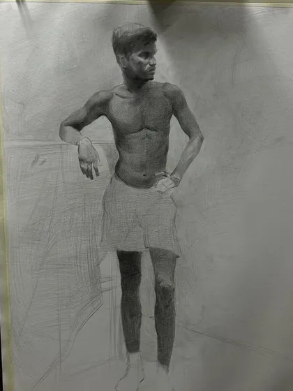 A full-length life drawing, showing the initial construction lines and the build-up of shading.