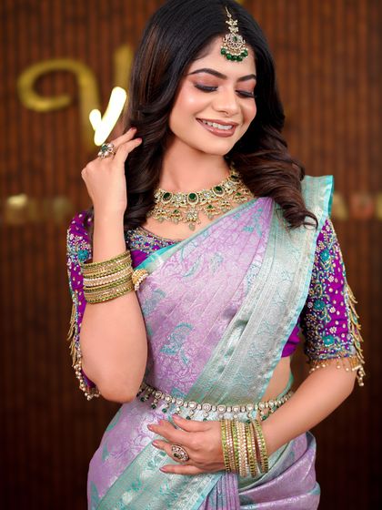 A series of photos showcasing a beautiful pastel purple and green silk saree. The soft, modern drape is perfect for a reception or pre-wedding event photoshoot.