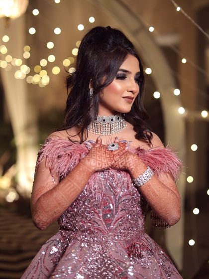 My stunning bride Gurusha for her engagement. This look was out of this world, with a dramatic smokey eye and a feathered gown for a truly unique style.