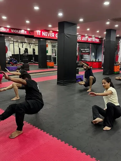 Students practice animal flow movements as part of their warm-up for BJJ class. These exercises build mobility, strength, and body awareness essential for grappling.
