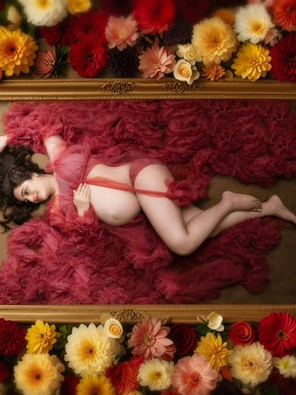 Ethereal beauty. This breathtaking top-angle capture radiates elegance, with a transparent gown, golden frame, and a border of flowers.