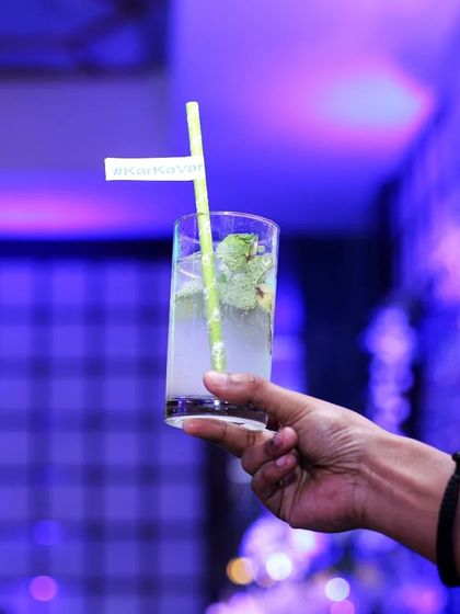 A close-up shot of a classic mojito, showcasing the fresh mint and lime. It's a simple yet elegant drink that's always a hit.