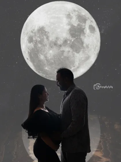 A romantic silhouette of a couple against a full moon backdrop, with a reflection effect for added artistry.