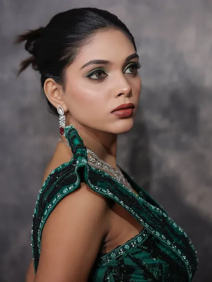 Another angle of this modern look, showing the edgy, textured bun hairstyle.