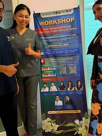 Posing with colleagues next to the banner for our Hair Transplantation Workshop in Bali, held in association with PERDOSKI, the Indonesian Society of Dermatology.