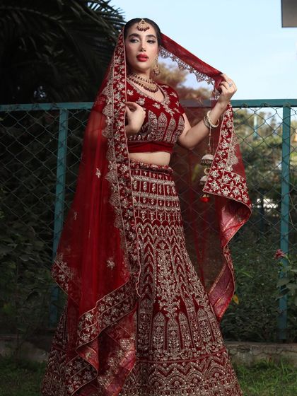 My beautiful international bride, fully embracing the traditional Indian bridal style. I created a look that felt authentic and made her feel like royalty.