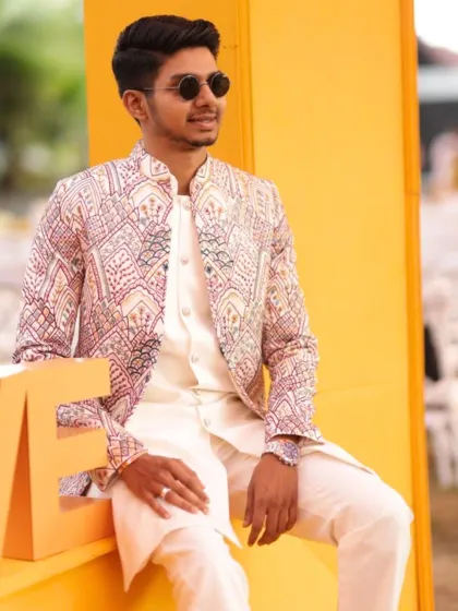 A client enjoying a festive event in a custom-made patterned jacket. My goal is to create pieces that not only look good but feel special for every celebration.