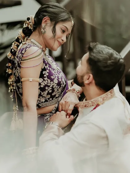 In a quiet moment away from the crowd, I capture the pure, unspoken connection between two people. This candid portrait focuses on the gentle touch and loving gaze that tells their entire story without a single word.