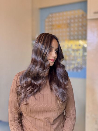This is what we call everyday glam. A beautiful balayage with shades of brown and caramel, creating a luxurious but wearable look that's perfect for any day.