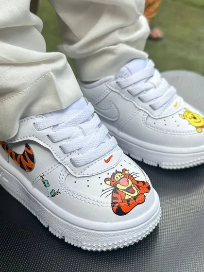 Can't go wrong with a classic. These custom kids' AF1s feature Winnie the Pooh and Tigger.