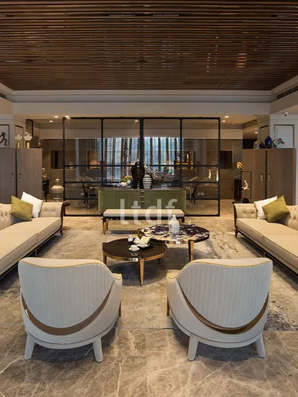 The expansive Alsorg India store, which we designed, exudes opulence with its sophisticated neutral color palette and grand scale. A glass partition enhances the sense of space, while intricate ceiling paneling adds a touch of grandeur to the luxurious atmosphere.