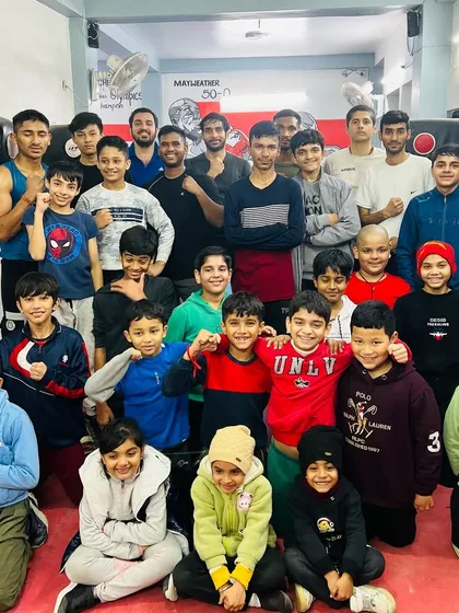 Post-workout picture with the team. We get better every day, together.