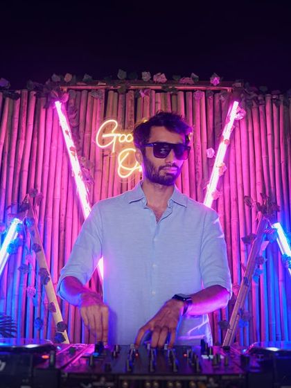 In the zone at Bombay Adda, mixing tracks under the neon lights.