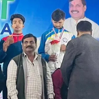 Md. Asif on the podium after winning a Bronze medal at the SGFI Nationals.