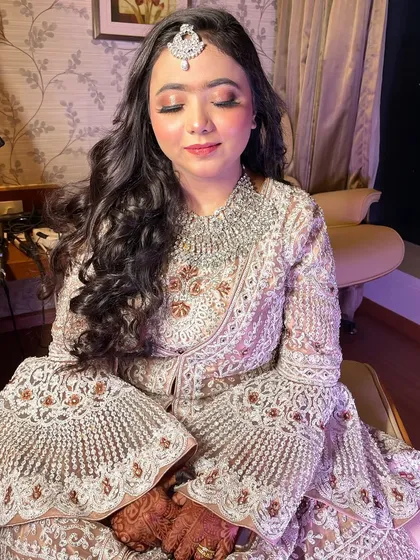 Make way for our gorgeous bride Farheen, dolled up for her reception. We created a soft, glowy makeup look that enhances her natural beauty.