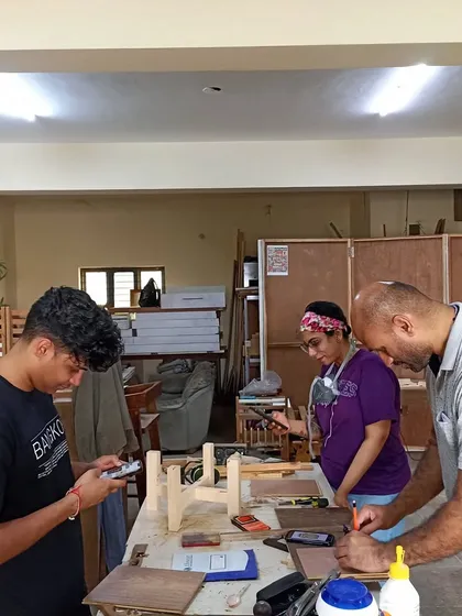 A family working together on their respective projects. It's a great way to spend quality time together while learning a new skill.