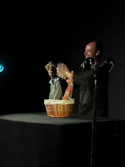 A tender moment between two hand puppets from the Spanish show 'Life (VIDA)'. Using only his hands and simple props, the puppeteer creates a deeply moving, wordless story about humanity.