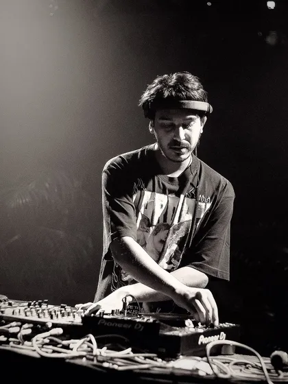 A shot from a live performance at Indiranagar Social. This captures my focus when I'm deep in a mix, reading the room and deciding where to take the sound next. Every set is a journey, and this is me navigating it.