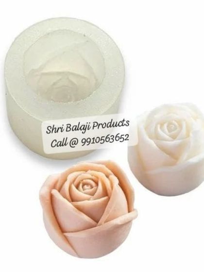 This image displays a rosebud mold along with two finished products in different colors. It shows the versatility of a single mold in creating varied and beautiful soaps or candles.
