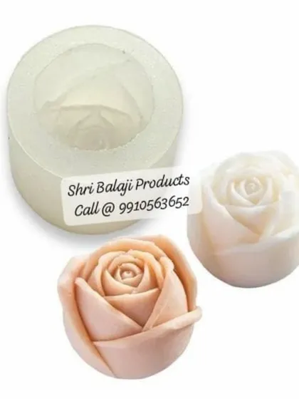 This image shows a small rosebud silicone mold and the resulting candles. These are great for making embeds, small gift soaps, or decorative wax melts.
