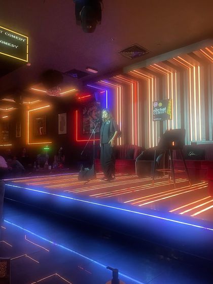 A full view of the cool stage at Nitchat Comedy in Dubai. I love performing for international audiences.