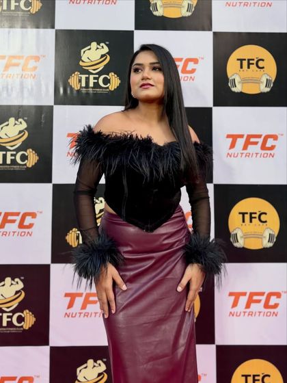 My look for the TFC launch event. The "Latex and Fur" outfit was a bold choice that matched the high-energy, glamorous vibe of the fitness brand's opening.