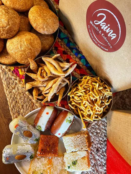 A close-up of our assorted sweets and namkeens. This is just a small sample of the delicious variety you can find at my shop.