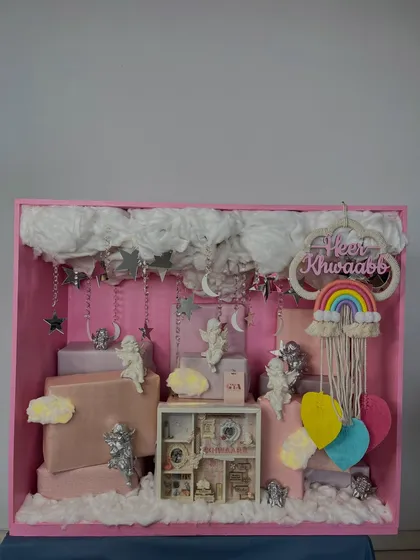 A straight-on shot of the 'Heer Khwaabb' baby hamper, showcasing the beautiful arrangement of personalized elements and themed decorations for a newborn.