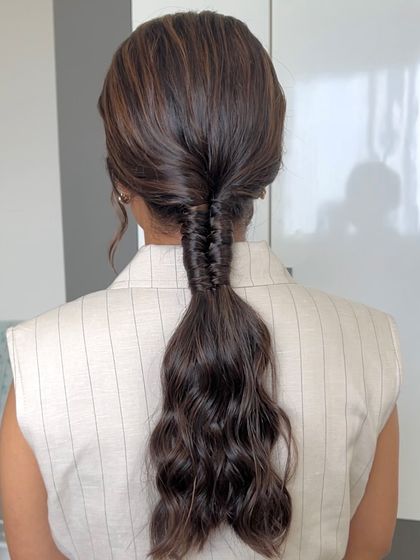 The fishtail pony on another client, showing its versatility.