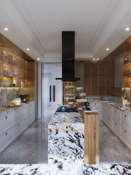 This gourmet kitchen combines bold design with practical function. The dramatic marble island serves as the centerpiece, complemented by custom cabinetry with integrated lighting and a layout planned for an intuitive culinary workflow.