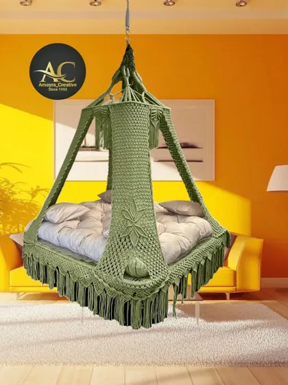 The same beautiful rectangular bed swing, this time in a calming olive green. This shows how the same design can have a completely different feel with a new color.