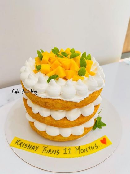 A naked mango cake celebrating 11 months of sweetness.