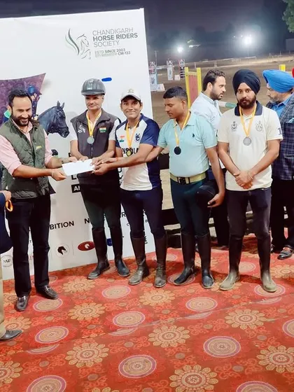 Our team receiving their prize after winning team bronze at the Chandigarh Horse Show. Teamwork is at the heart of our success.