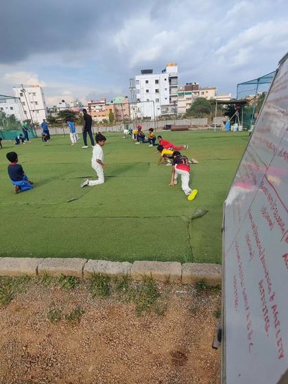 A view of our training ground with a whiteboard outlining the day's session plan. Our coaching is structured and well-planned.