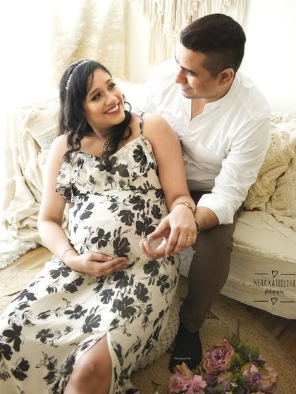 The genuine smiles and loving gaze between this couple are what make this photo so special. My goal is to capture the real emotions of your journey to parenthood.