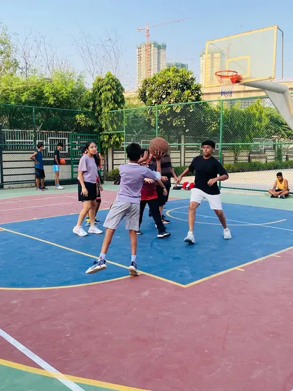 A player looks to score over a defender.