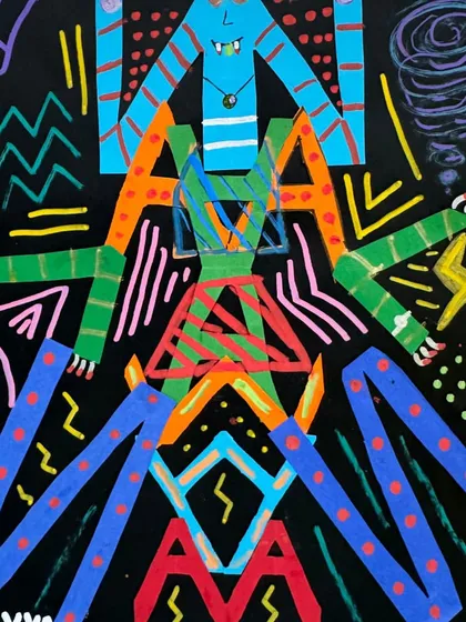 A student's name transformed into a vibrant, symmetrical monster. This project teaches the principles of symmetry and self-expression through letterforms.