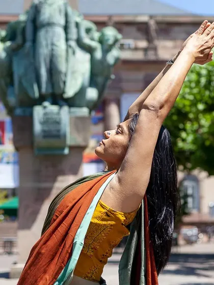 Spirituality for me is treating every living being with the same love and care. This pose, Hasta Uttanasana, in a public square is a reminder to keep my heart open to the world.